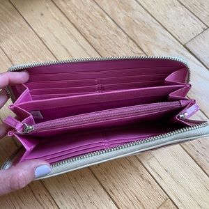 Coach wallet, holds 12 cards, interior zipper pouch, exterior pocket